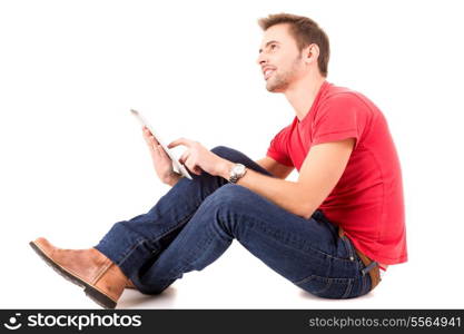 Young happy student working with a new digital tablet computer, isolated