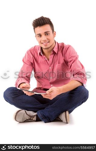 Young happy student working with a new digital tablet computer, isolated