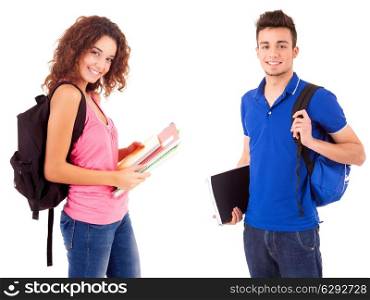 Young happy students posing over white background
