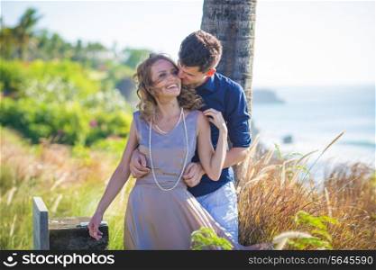 Young Happy Wedding Couple at Sunny Day