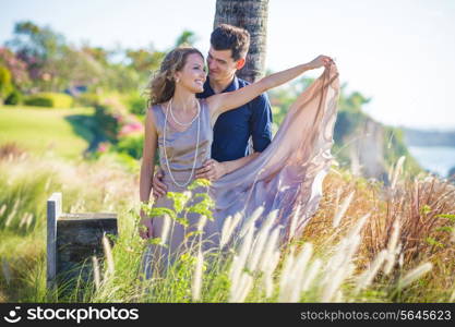 Young Happy Wedding Couple at Sunny Day