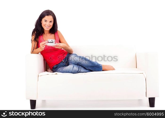 Young happy woman at house, taking a moment to relax