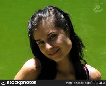 young happy woman close up portrait, outdoor picture