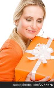 Young happy woman hold birthday present on white