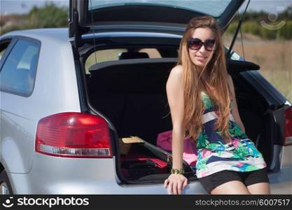 Young happy woman leaving for vacations
