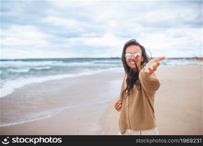 Young happy woman on beach vacation. Young happy woman on the beach