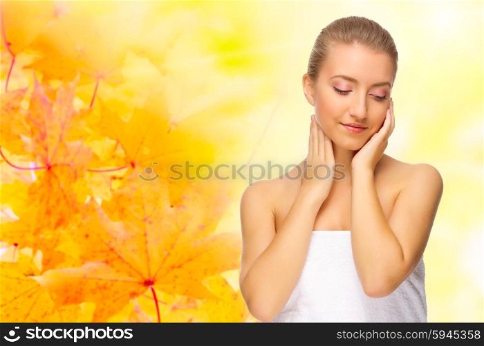 Young healthy girl on autumn background