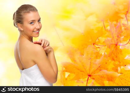 Young healthy girl on autumnal background