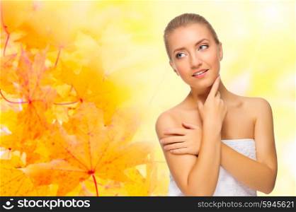 Young healthy girl on autumnal background