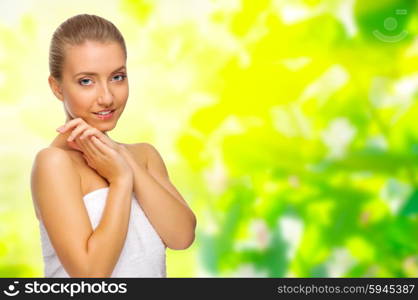 Young healthy girl on floral spring background