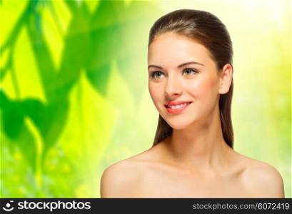 Young healthy girl on floral spring background