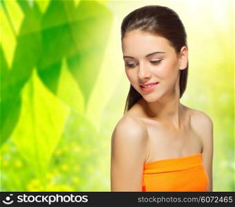 Young healthy girl on floral spring background