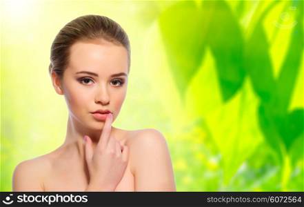 Young healthy girl on spring floral background