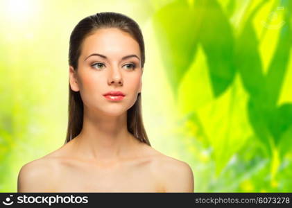 Young healthy girl on spring floral background