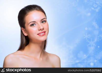 Young healthy girl on winter background