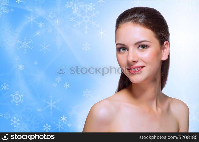 Young healthy girl on winter background