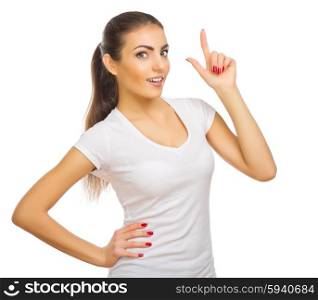 Young healthy girl shows pointing gesture isolated