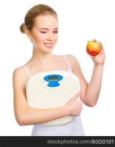 Young healthy girl white apple and scales isolated