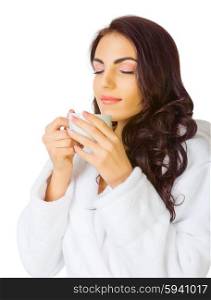 Young healthy girl with bathrobe and cup isolated