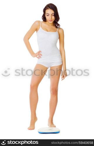 Young healthy girl with home scales isolated