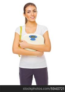 Young healthy girl with measurement tape and scales isolated