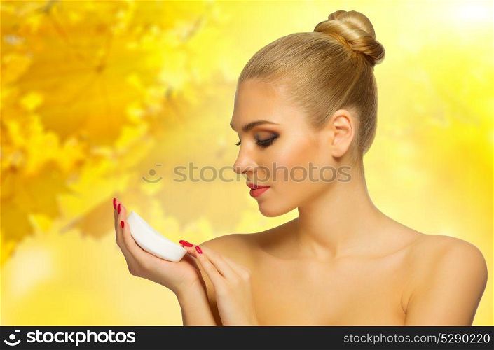 Young healthy woman at autumnal background