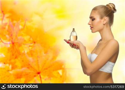 Young healthy woman on autumnal background