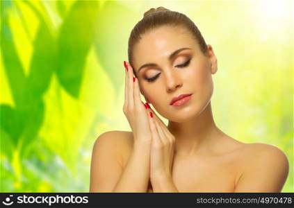 Young healthy woman on floral background