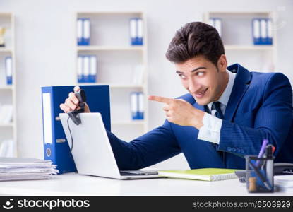 Young help desk operator working in office