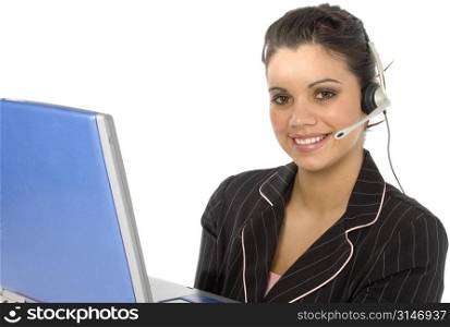 Young Hispanic business woman with computer and headset.