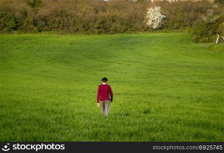 Young in meadow green meadow. Conceptual scene.