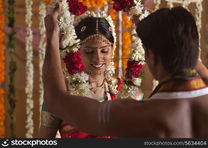 Young Indian couple during wedding ceremony
