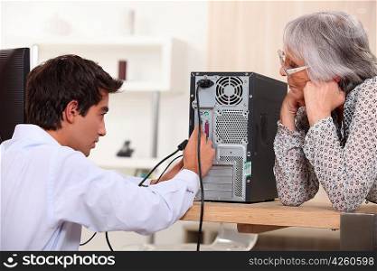Young installing computer