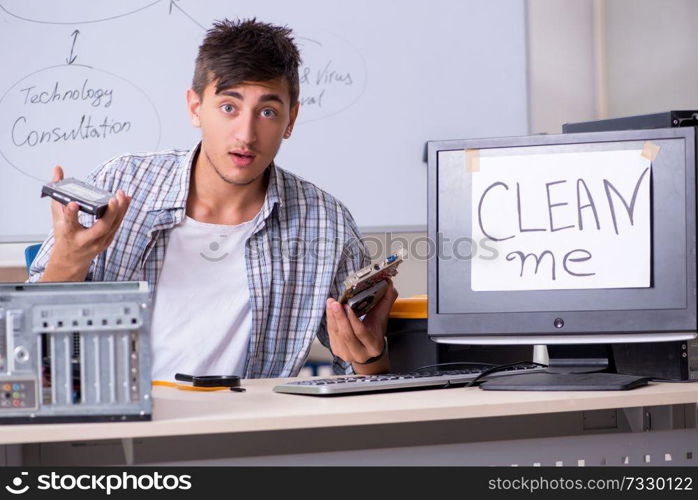 Young it specialist in front of the whiteboard 