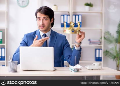 Young king businessman working in the office 