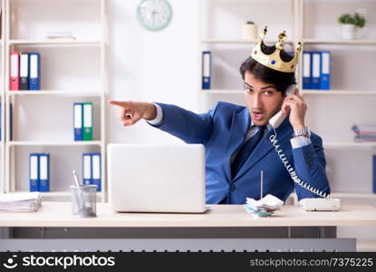 Young king businessman working in the office 