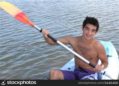 Young lad kayaking