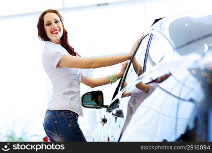 Young lady at car salon