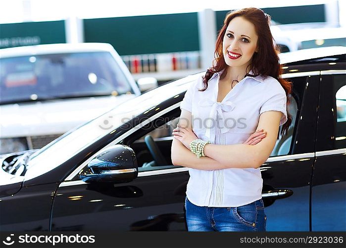 Young lady at car salon