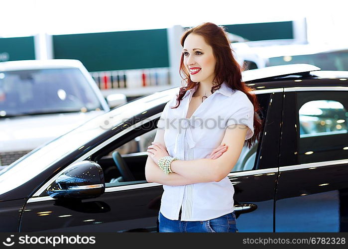 Young lady at car salon