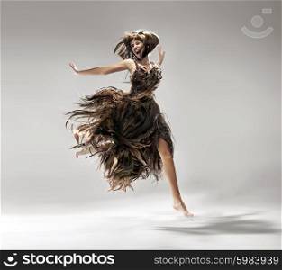 Young lady wearing dress made of hair