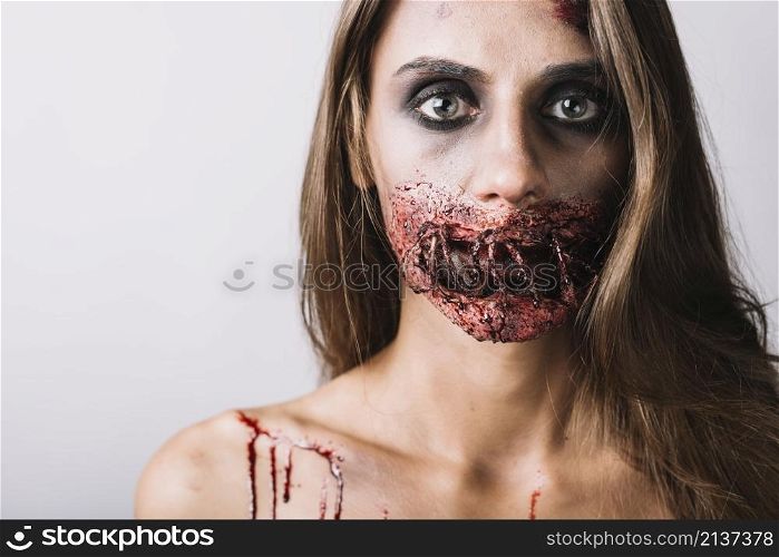 young lady with creepy makeup