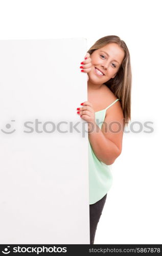 Young large beautiful woman presenting your product, isolated over white background