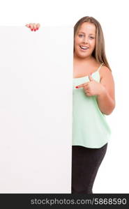 Young large beautiful woman presenting your product, isolated over white background