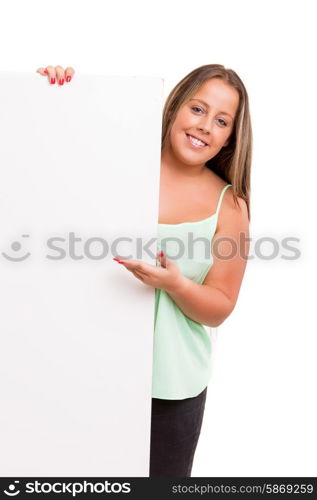 Young large beautiful woman presenting your product, isolated over white background