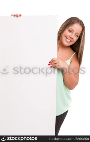 Young large beautiful woman presenting your product, isolated over white background