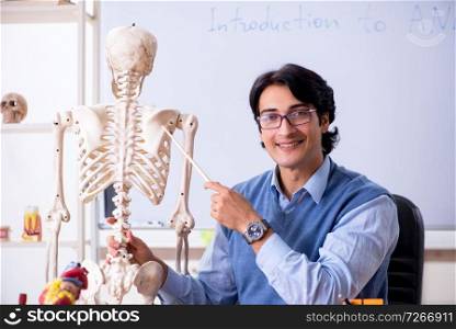 Young lecturer teacher teaching anatomy