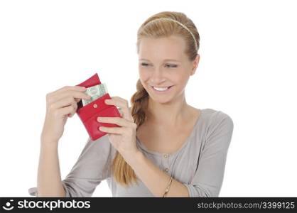 Young long-haired woman gets out of the pouch dollar banknotes. Isolated on white