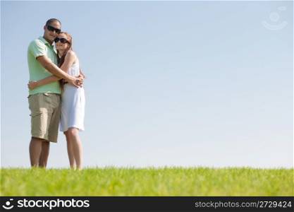 young love couple hug in the park