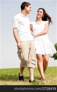 young love couple walk togther and smiling